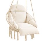 Cream macramé hammock chair with thick cushions and fringe detail — Hammora Cocoon Chair, hand-woven cotton hanging chair with plush back, side, and seat cushions