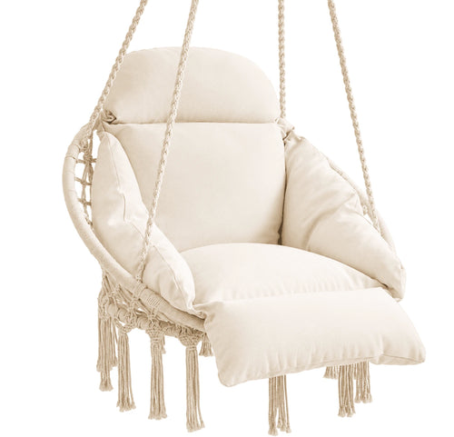 Cream macramé hammock chair with thick cushions and fringe detail — Hammora Cocoon Chair, hand-woven cotton hanging chair with plush back, side, and seat cushions