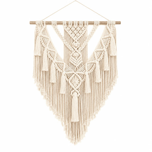 Hammora Solstice macrame wall hanging in cream cotton with geometric V-pattern and cascading fringe on white background