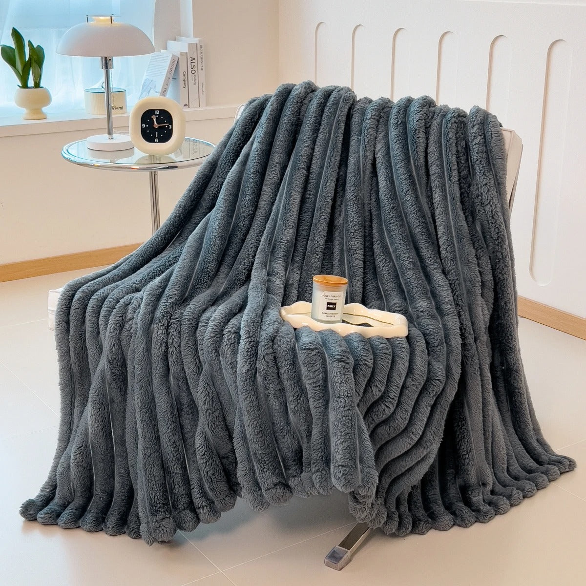 Cloud-Ribbed Throw Blanket styled in a warm, quiet living space